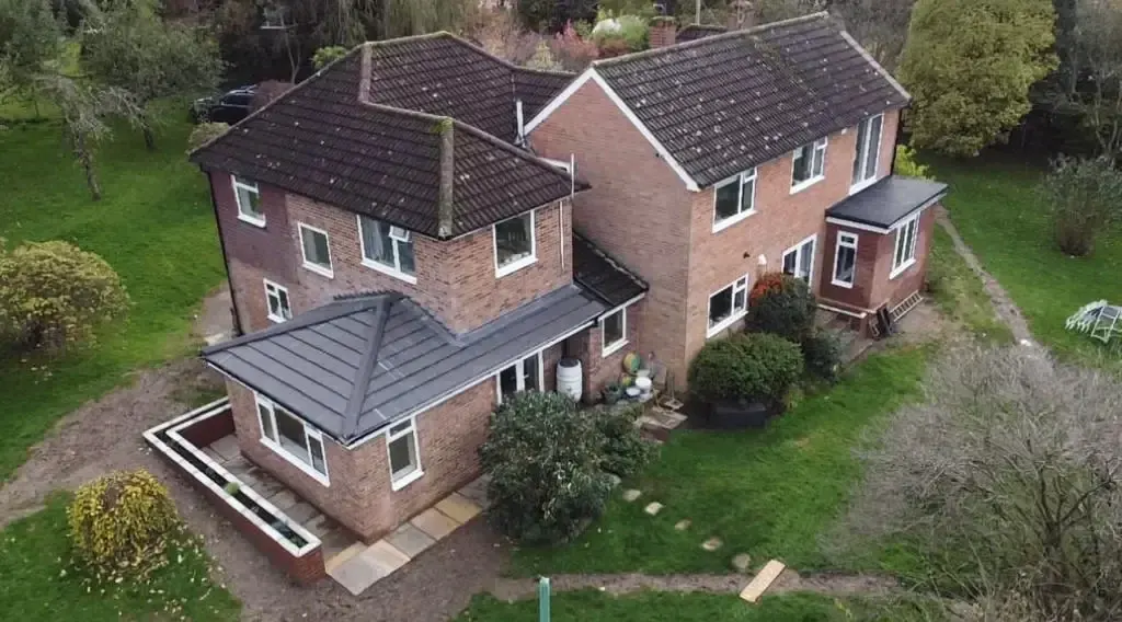 Brick house with modern rear extension