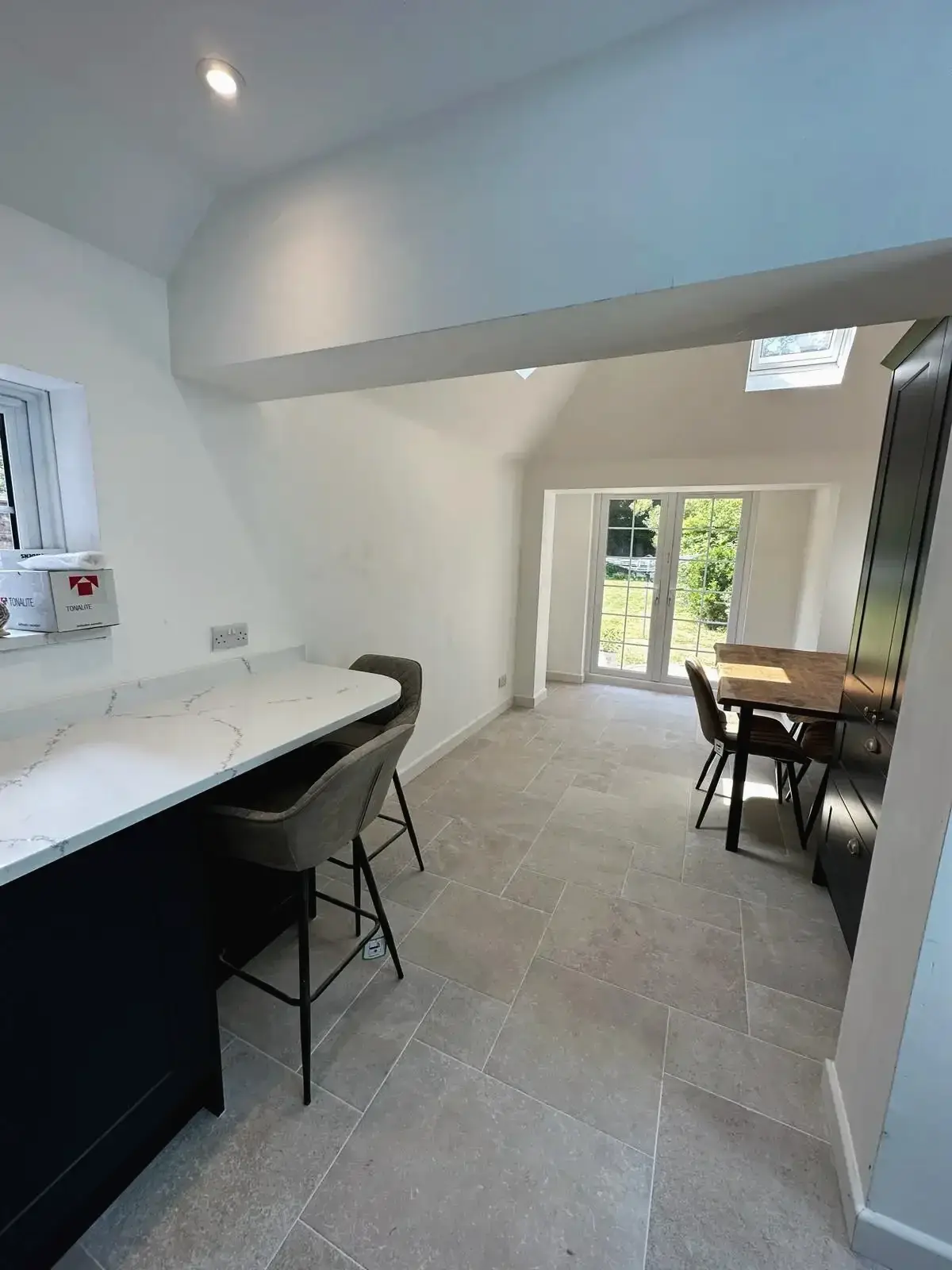 Bright and airy kitchen extension with breakfast bar