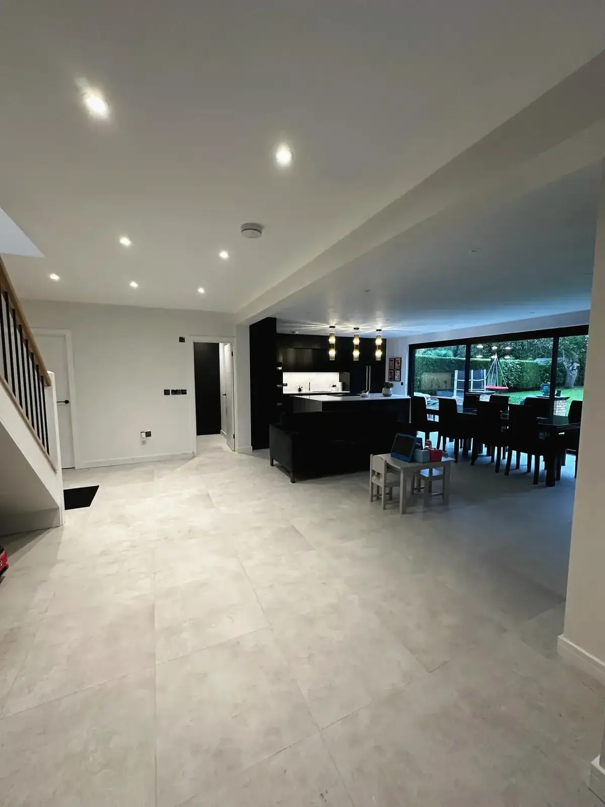 Contemporary home extension with large glass doors