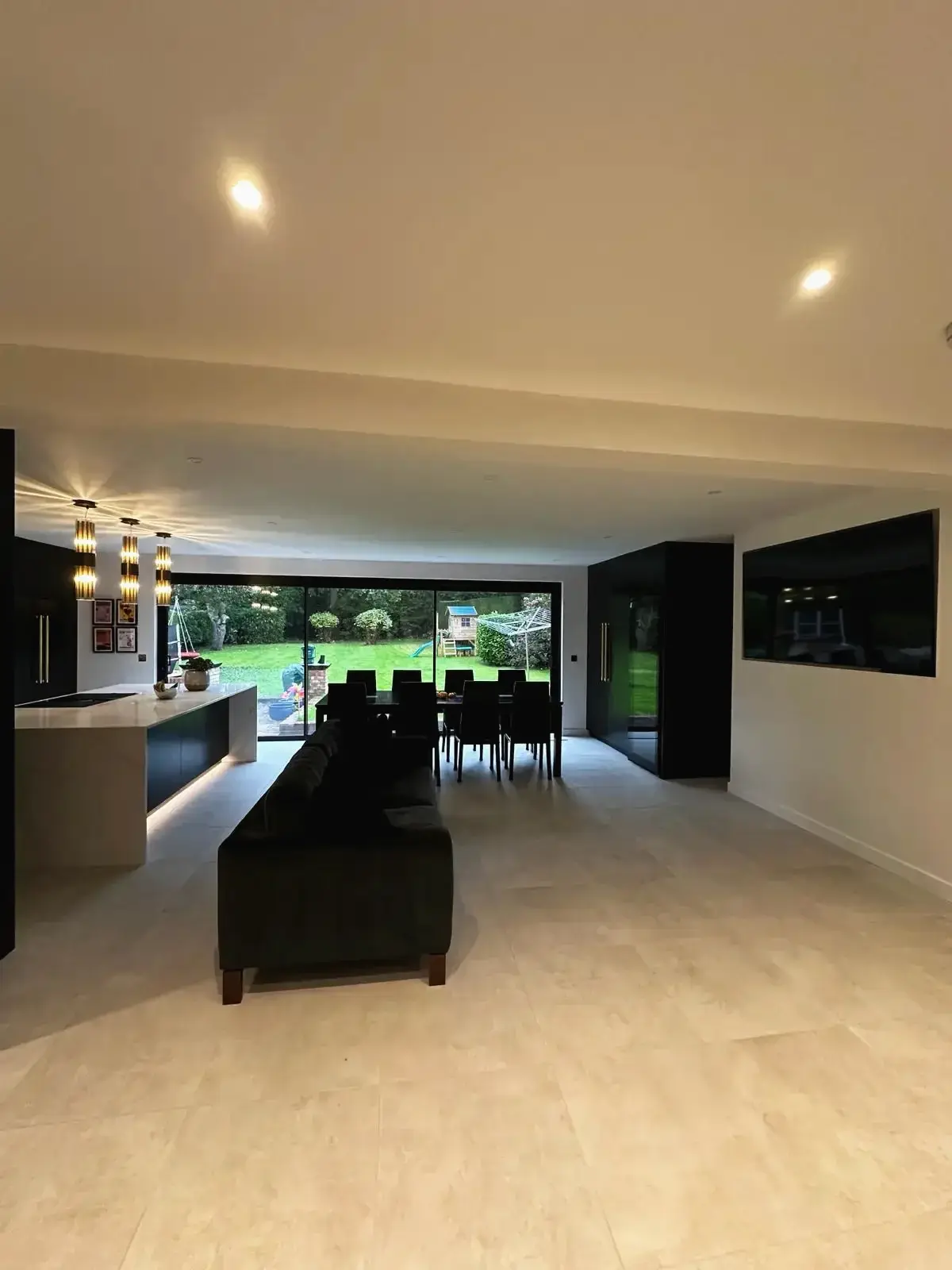 Elegant interior design featuring modern island kitchen and dining table