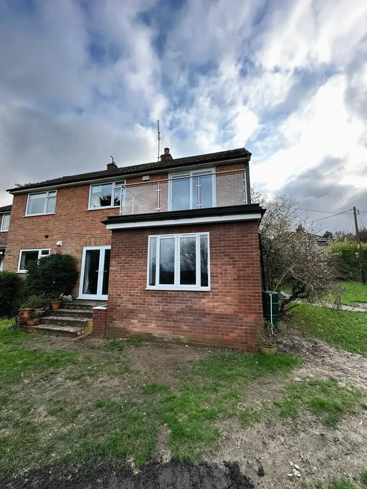 Home improvement project featuring single-storey brick extension