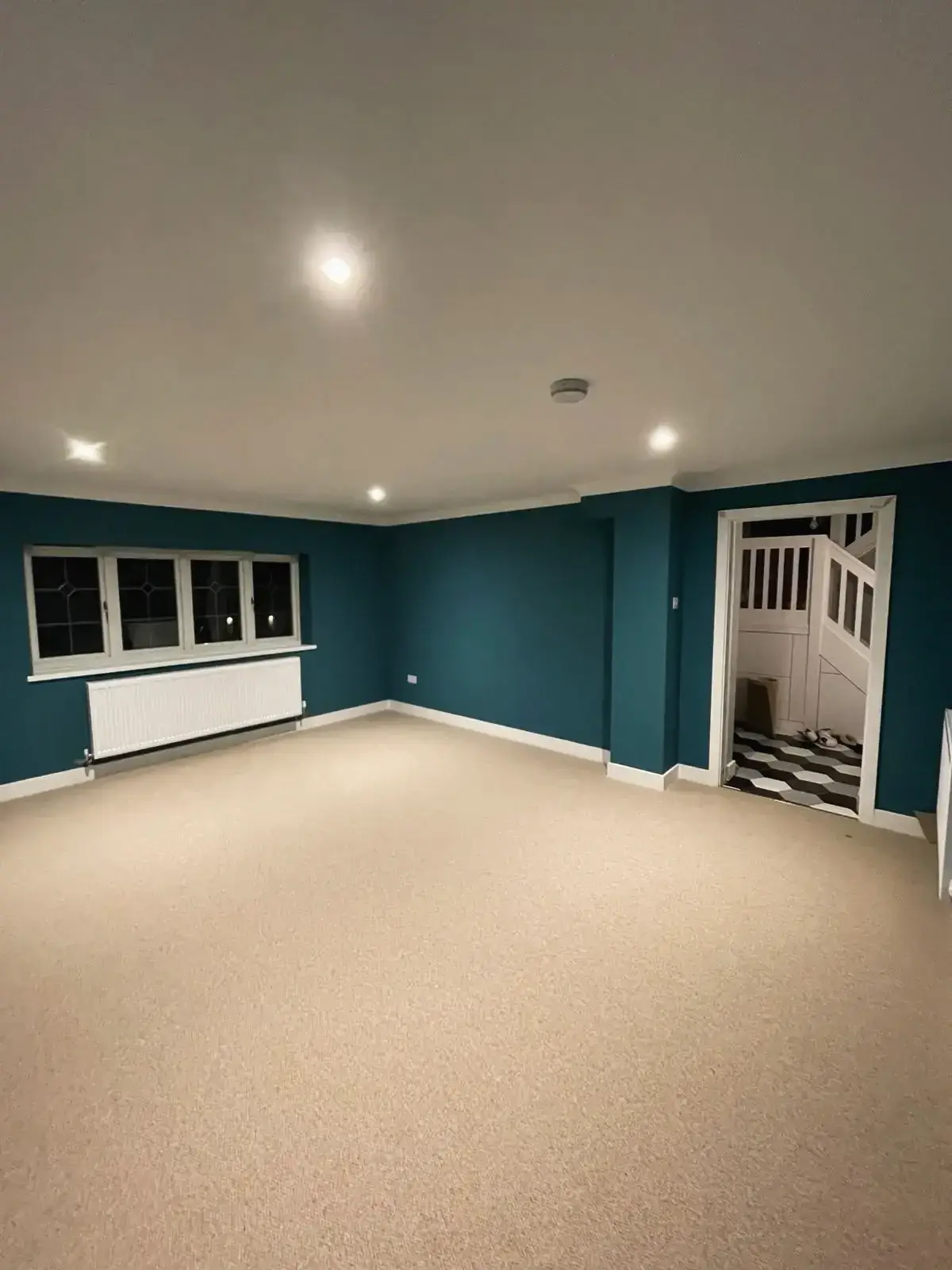 Interior refurbishment with new carpet and painted walls