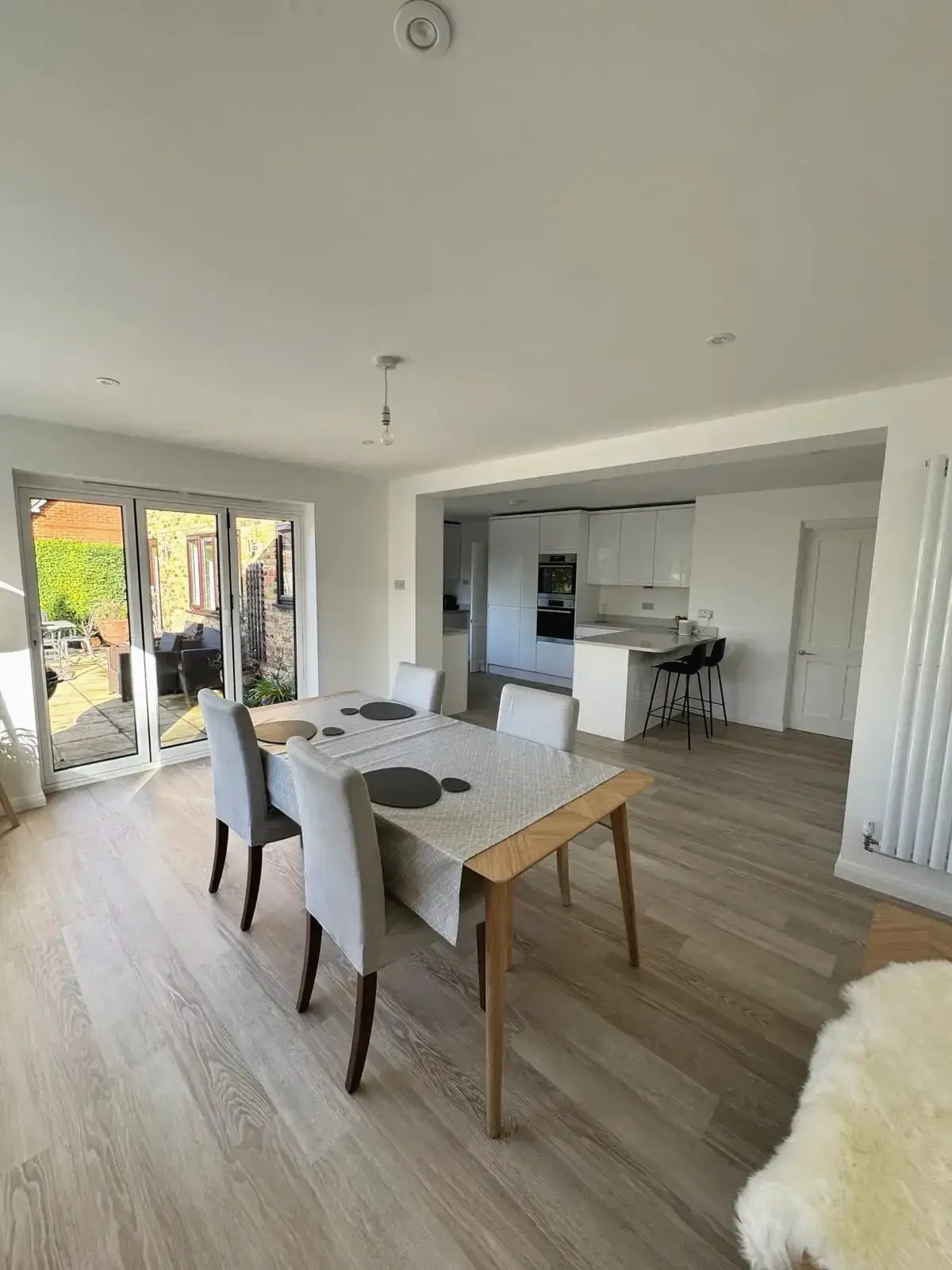 Modern dining space connected to open-plan kitchen