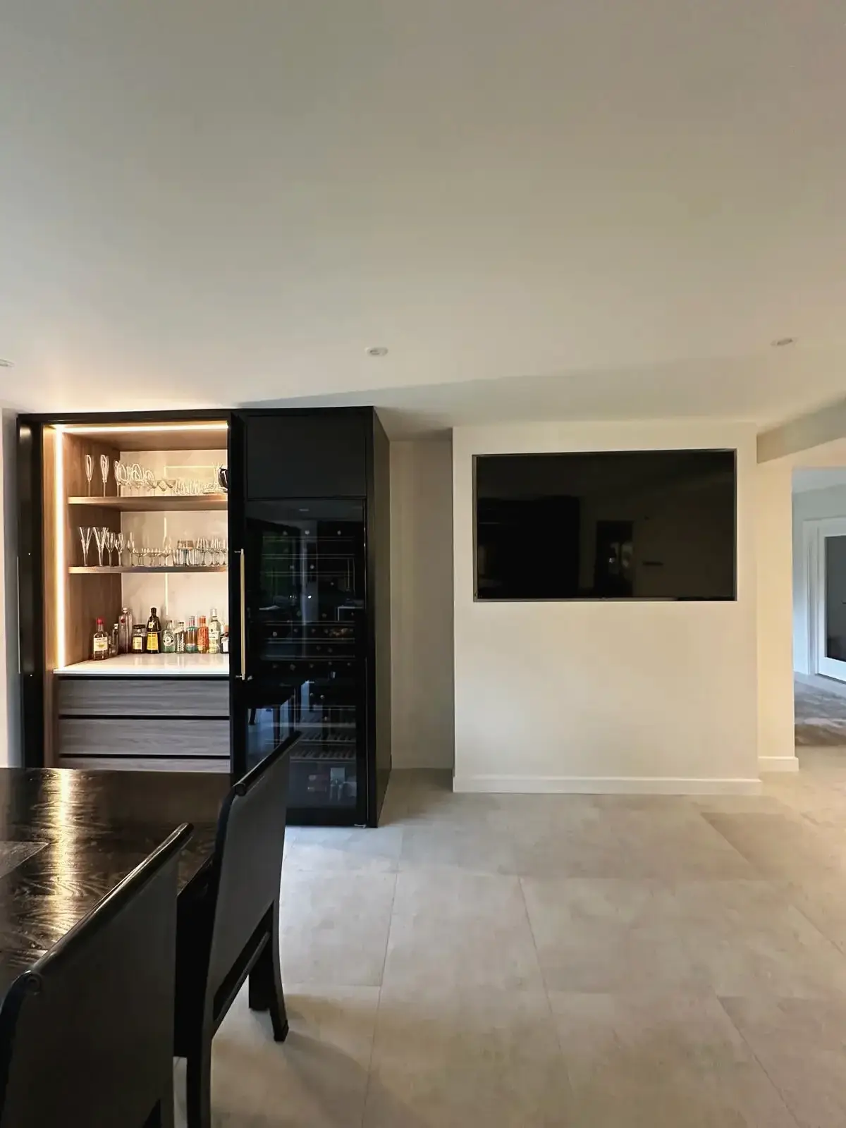 Modern home bar cabinet with glass shelving