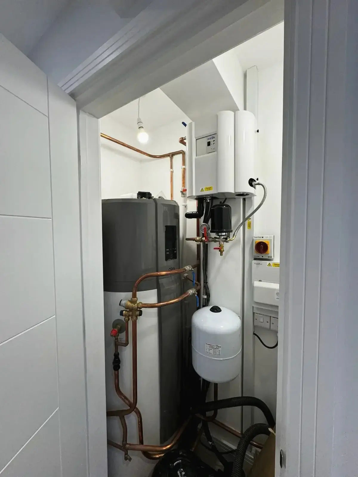 Modern water heating system with copper piping installed