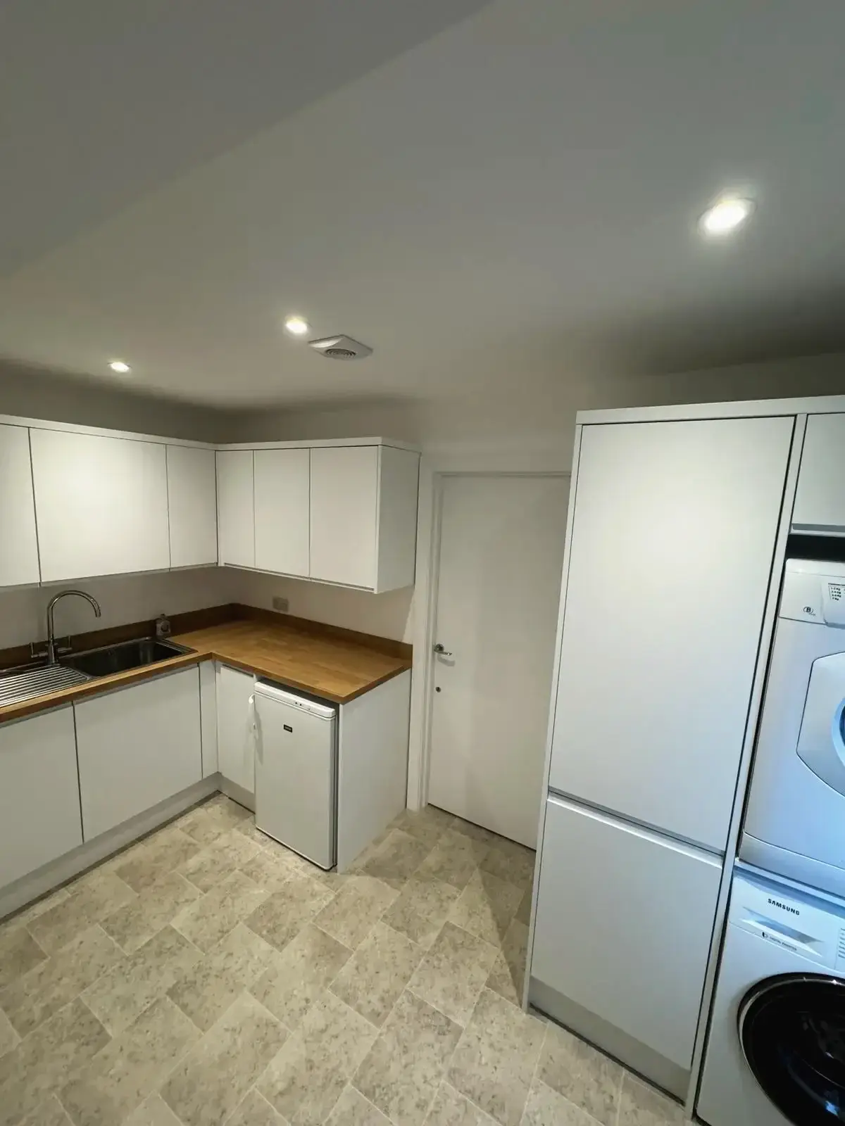 Newly fitted kitchen with fresh design and upgraded finishes