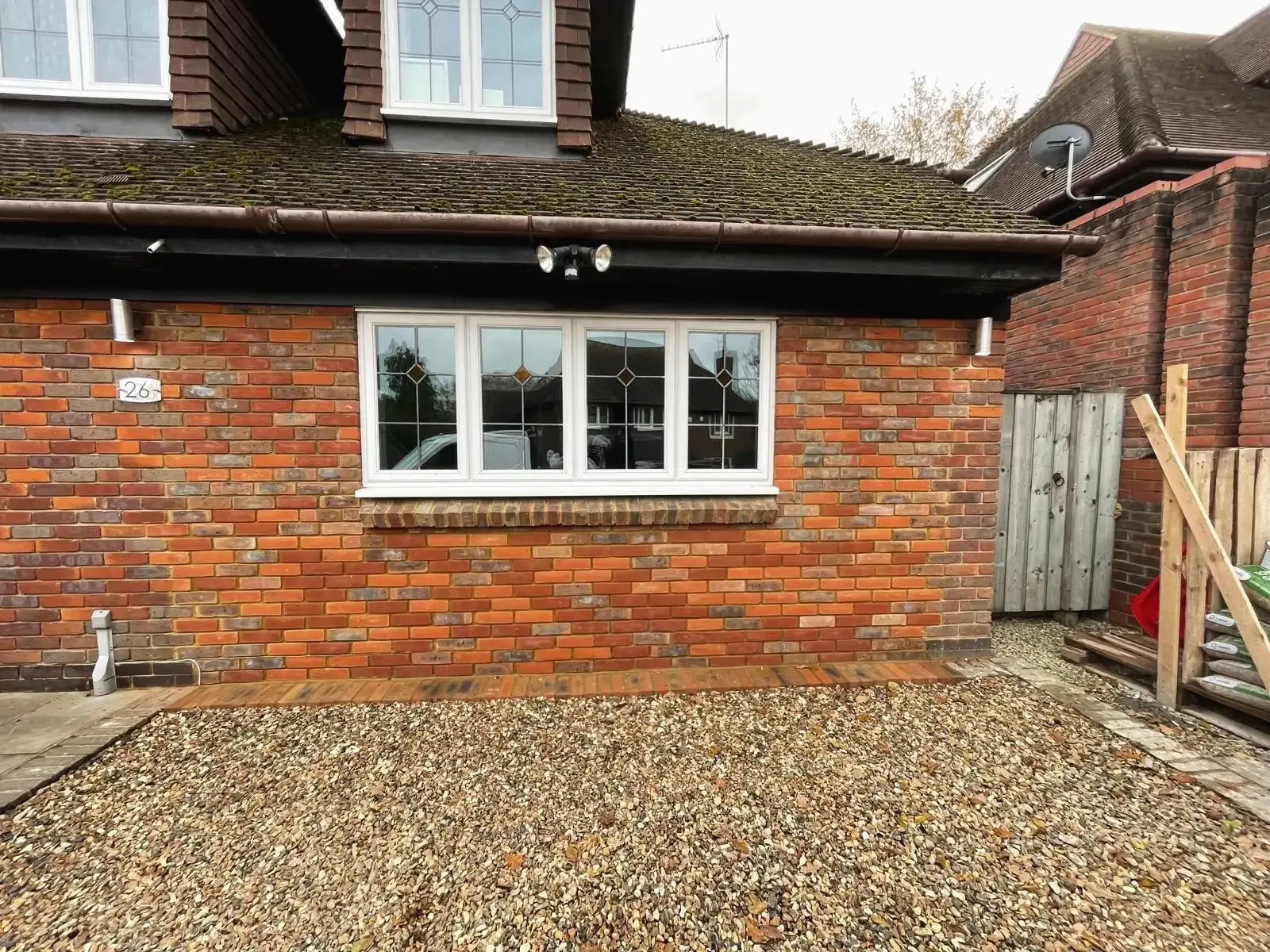 Renovated exterior wall with modern double glazed windows