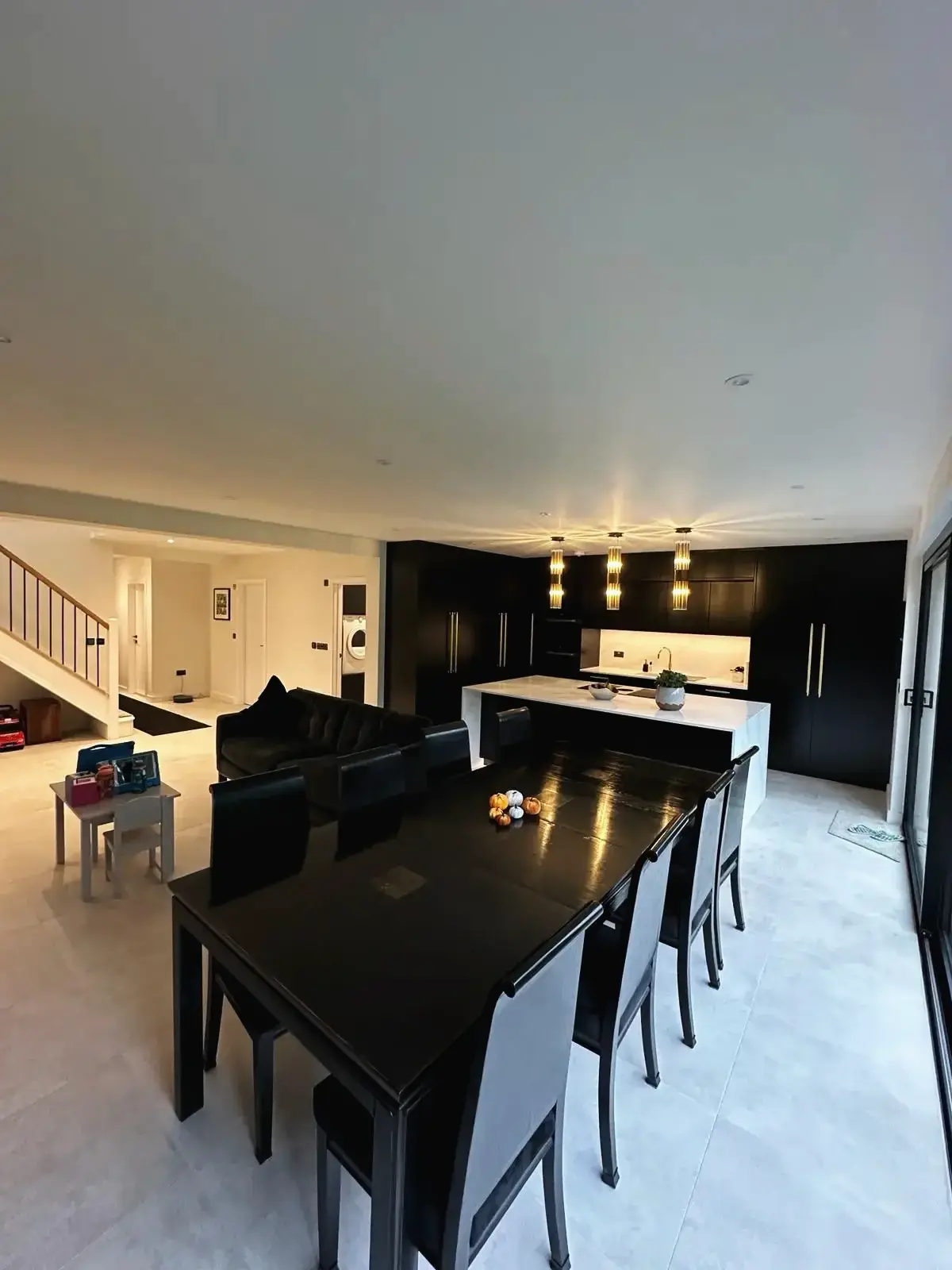 Spacious open-concept kitchen, dining, and lounge design