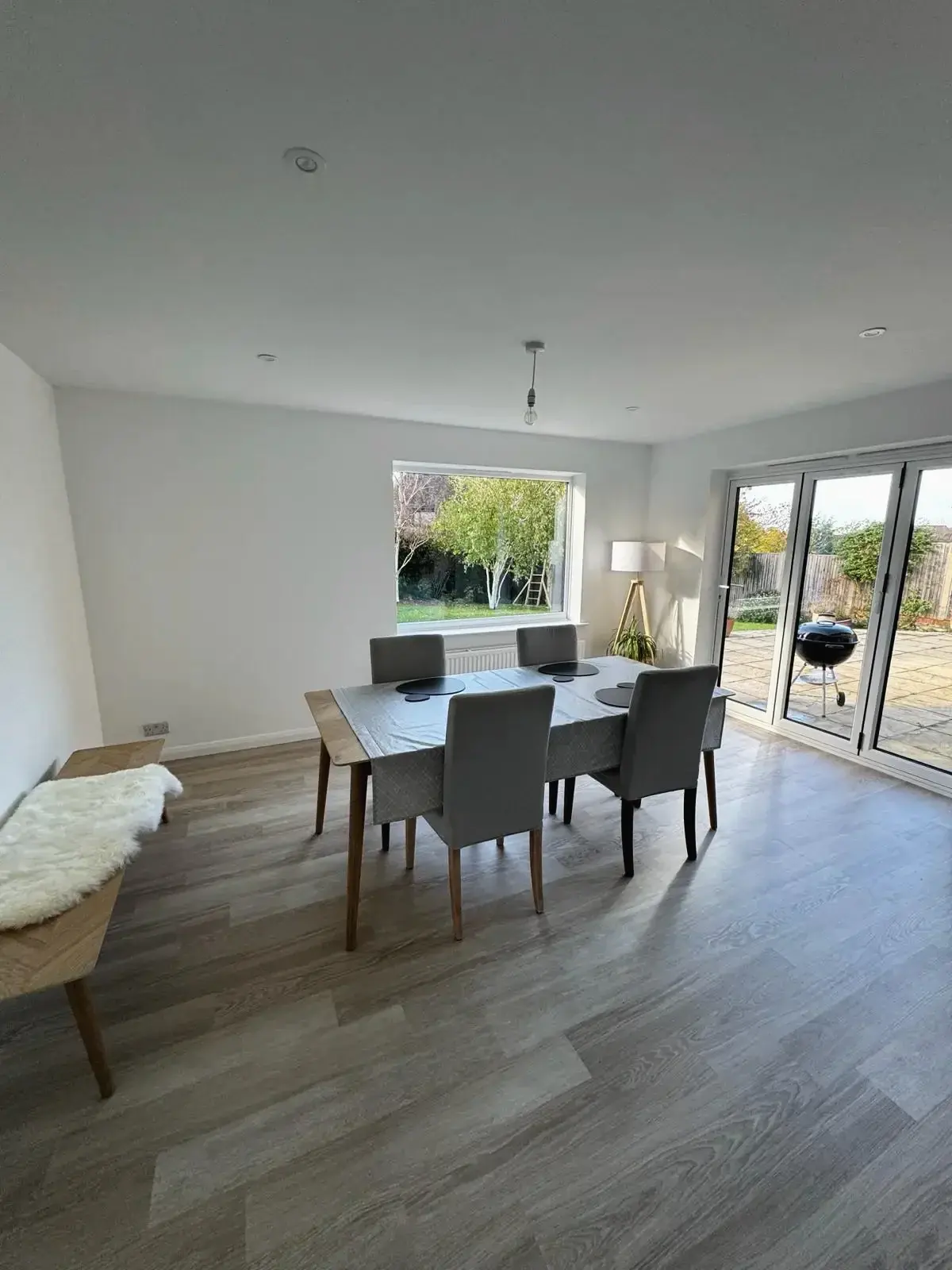 Stylish dining space with natural light and contemporary design
