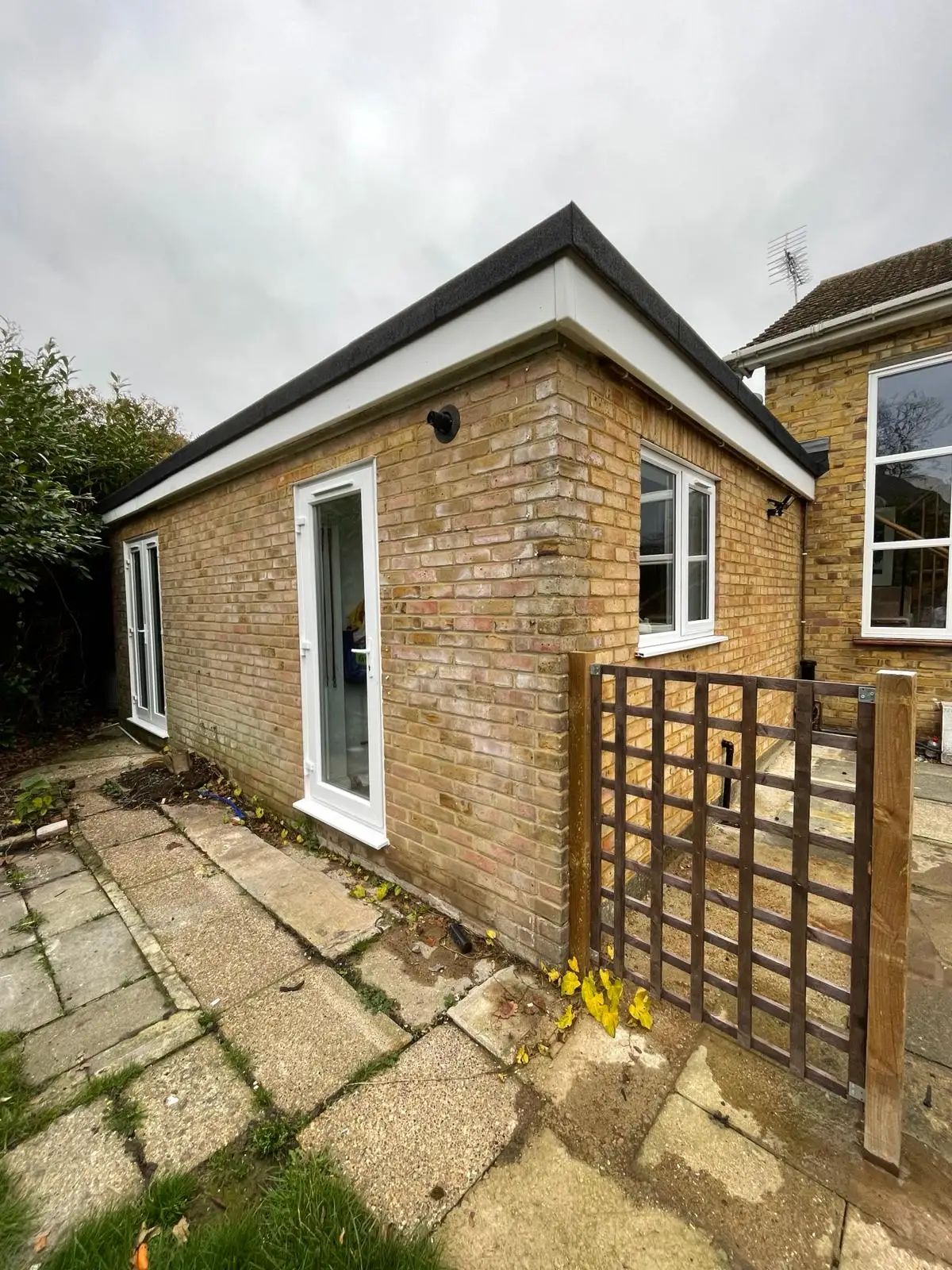 Home renovation with rear extension in brickwork by Godman Construction