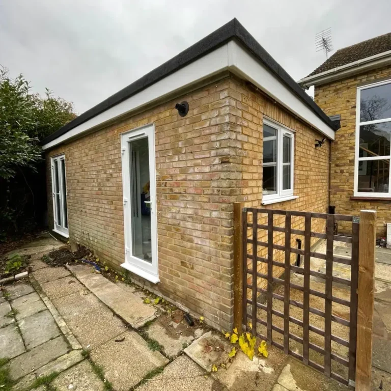 Home renovation in guildford with rear extension in brickwork by Godman Construction
